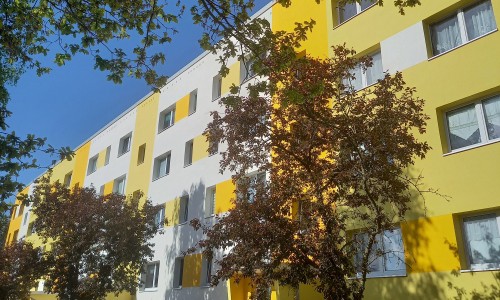2505 Kooiman_onze woonblokken stralen in de zon.jpg